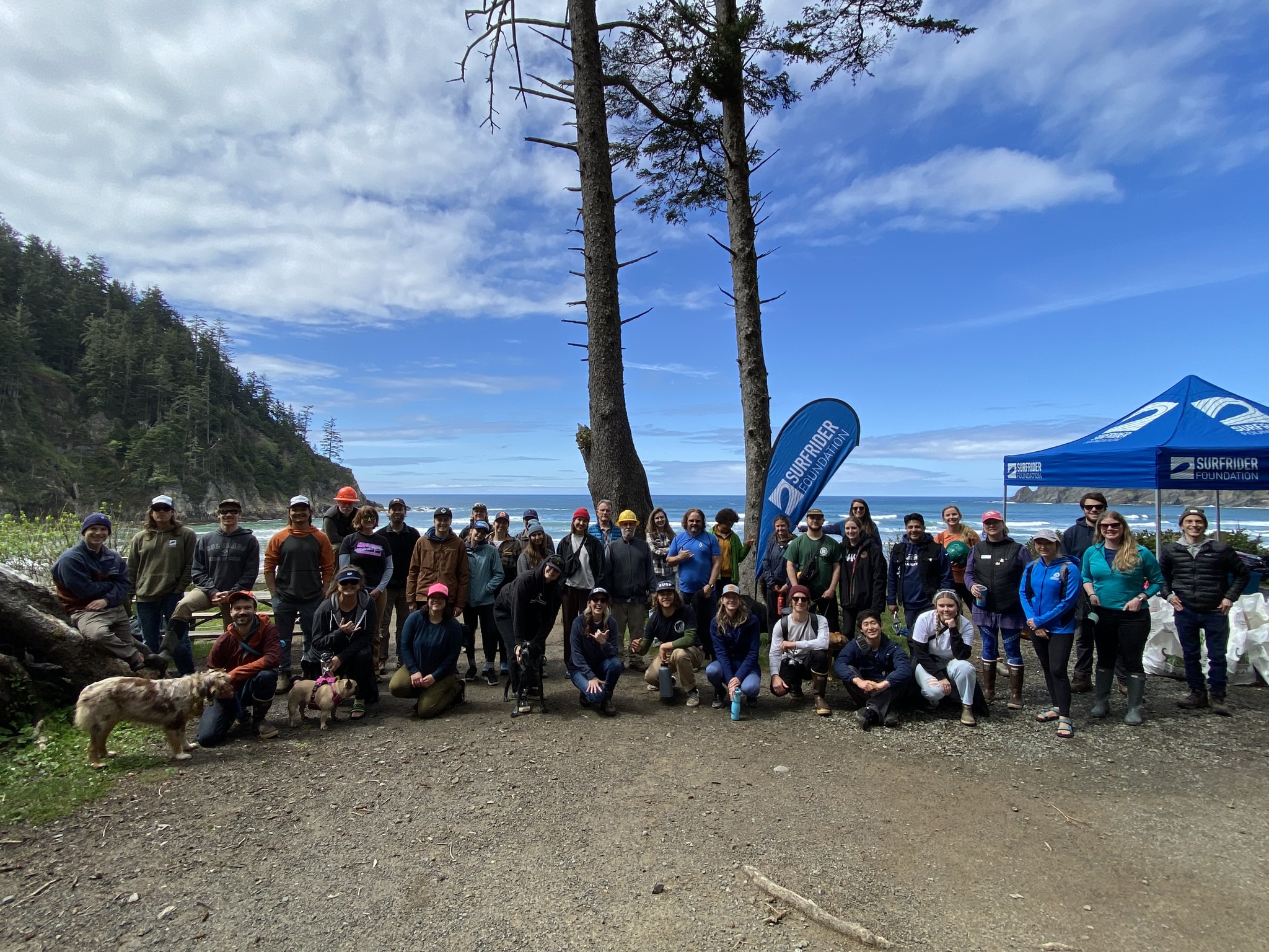 Our awesome volunteers posing for a post-cleanup action day photo at Short Sand Beach