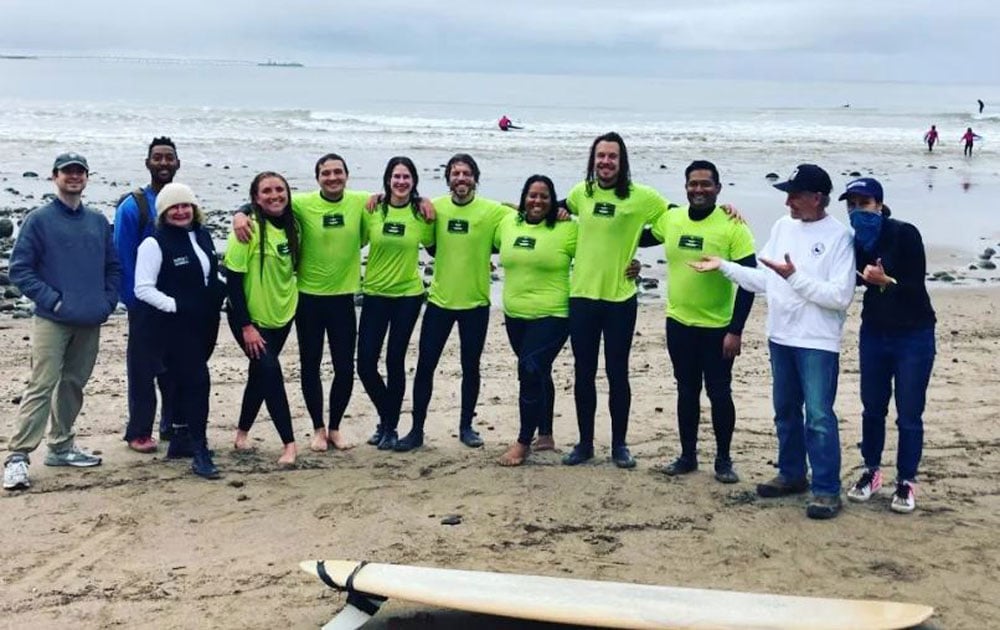 Andrika Payne With the Los Angeles Chapter with a group of people who surfed in the Rincon Invitational 