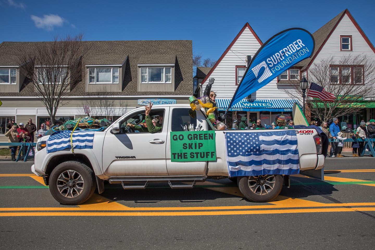 A Surfrider decorated truck driving in the St Pattys Parade 2022 