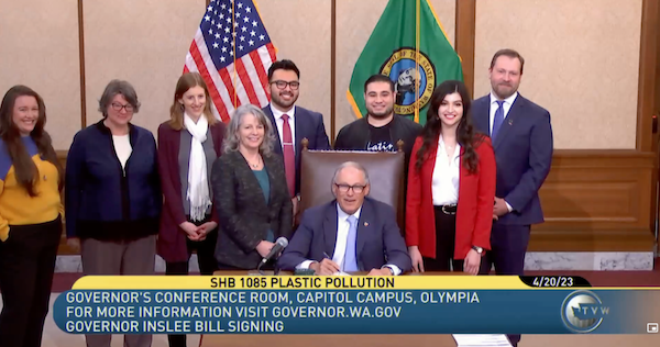 Elected leaders and members of our Plastic Free WA Coalition signing HB 1085 into law