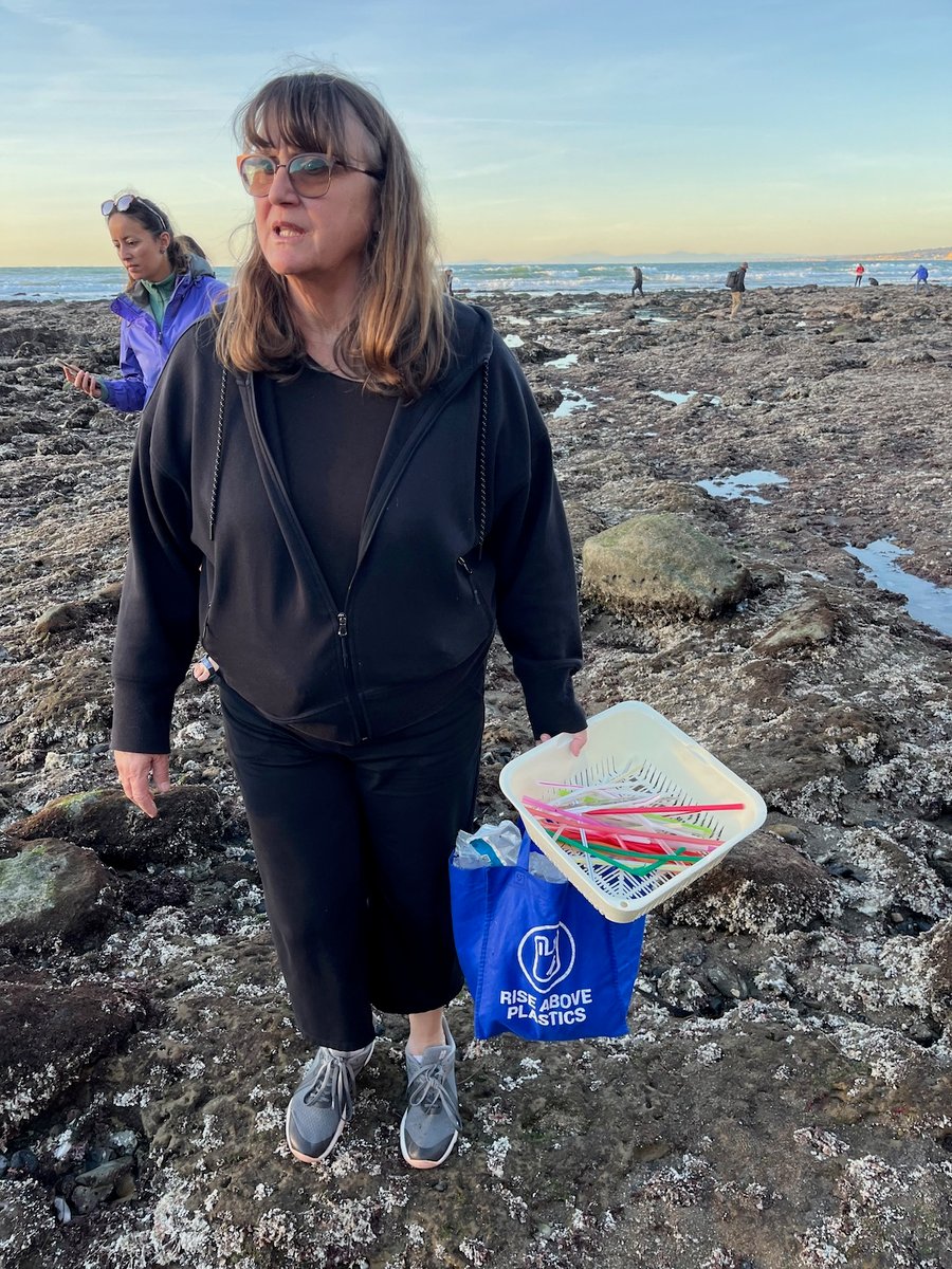 Janis in her element, cleanup plastics from the beach