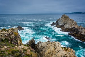 Large rocks and waves in the Pacific Ocean, seen from a beach at Point Lobos State Natural Reserve, in Carmel, California.-2
