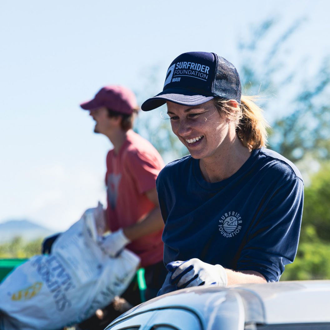 Volunteers helping at a Maui Surfrider beach cleanup