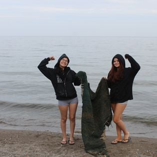 Girls Removing Debris from Spitzer Beach in Lorain Ohio