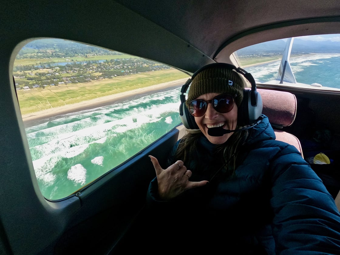 Surfrider volunteer Chanel Hason aboard a flight mission with partner LightHawk