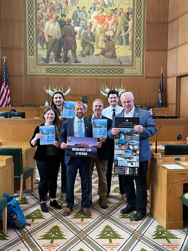 Photo of Oregon staff, coalition members and Representative Gomberg on House floor
