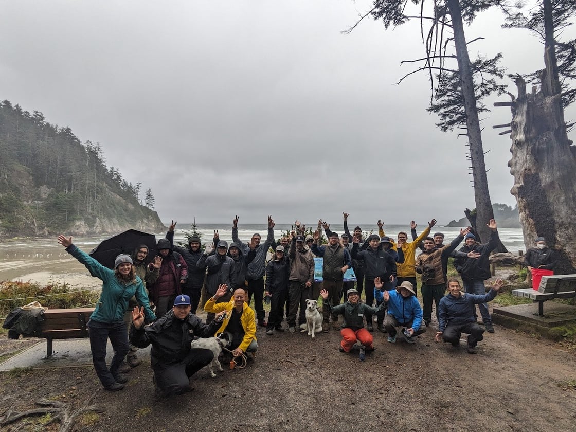 volunteers at a very rainy short sands beach