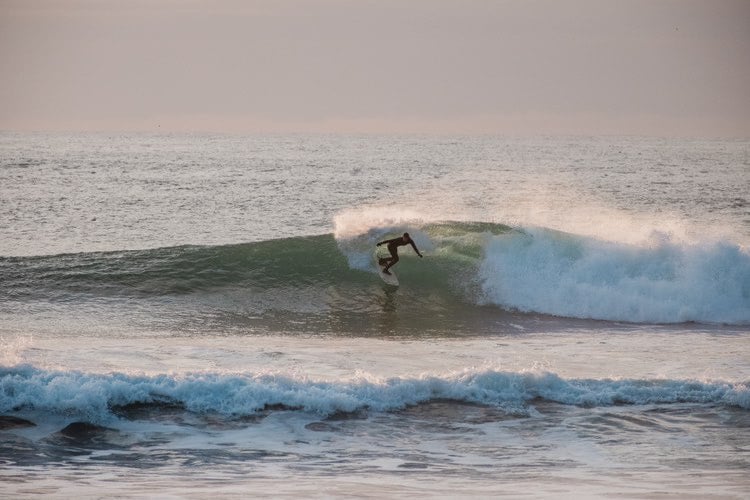 Photo of Amelia surfing