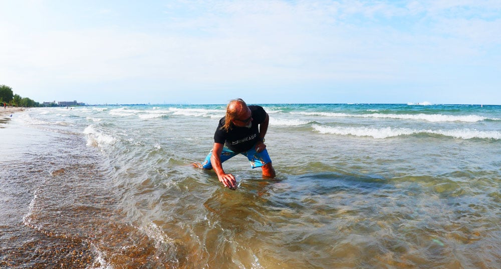 Steve Arman with the Chicago Surfrider Chapter collecting water samples