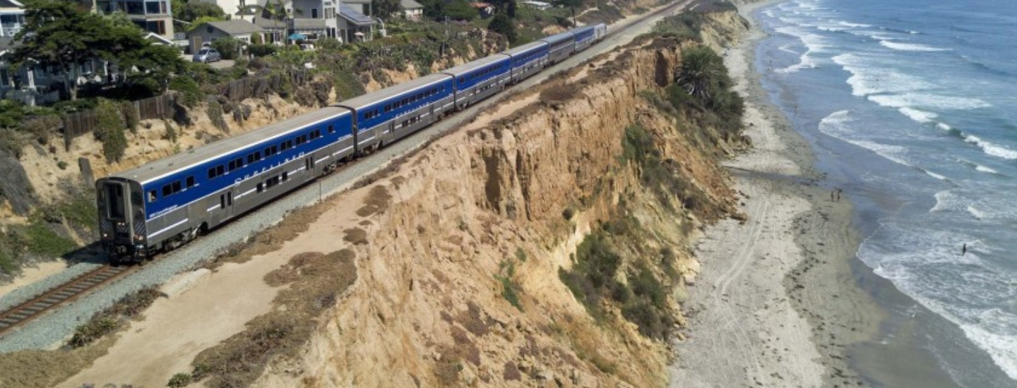 aerial view of the Coaster rail on the edge of the bluffs above Del Mar beach. 