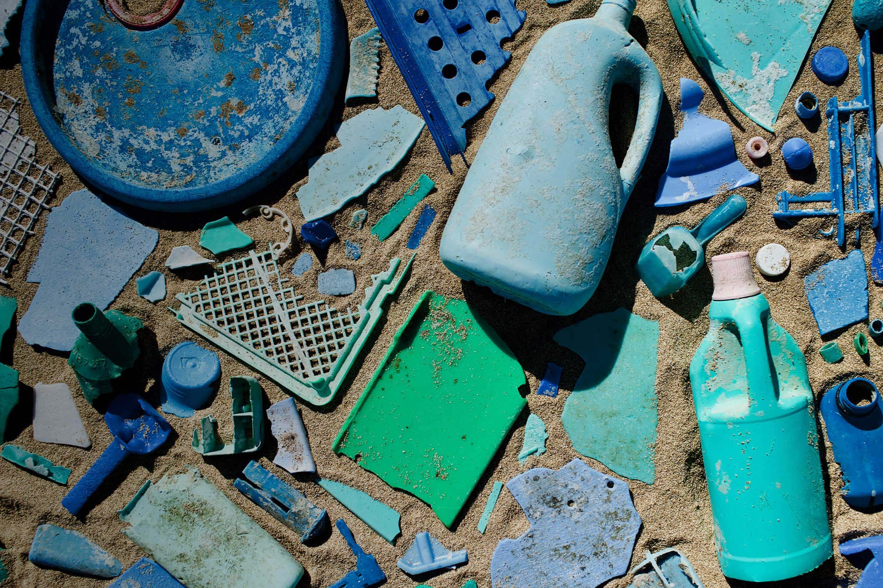 Pile of plastic items found during cleanup.