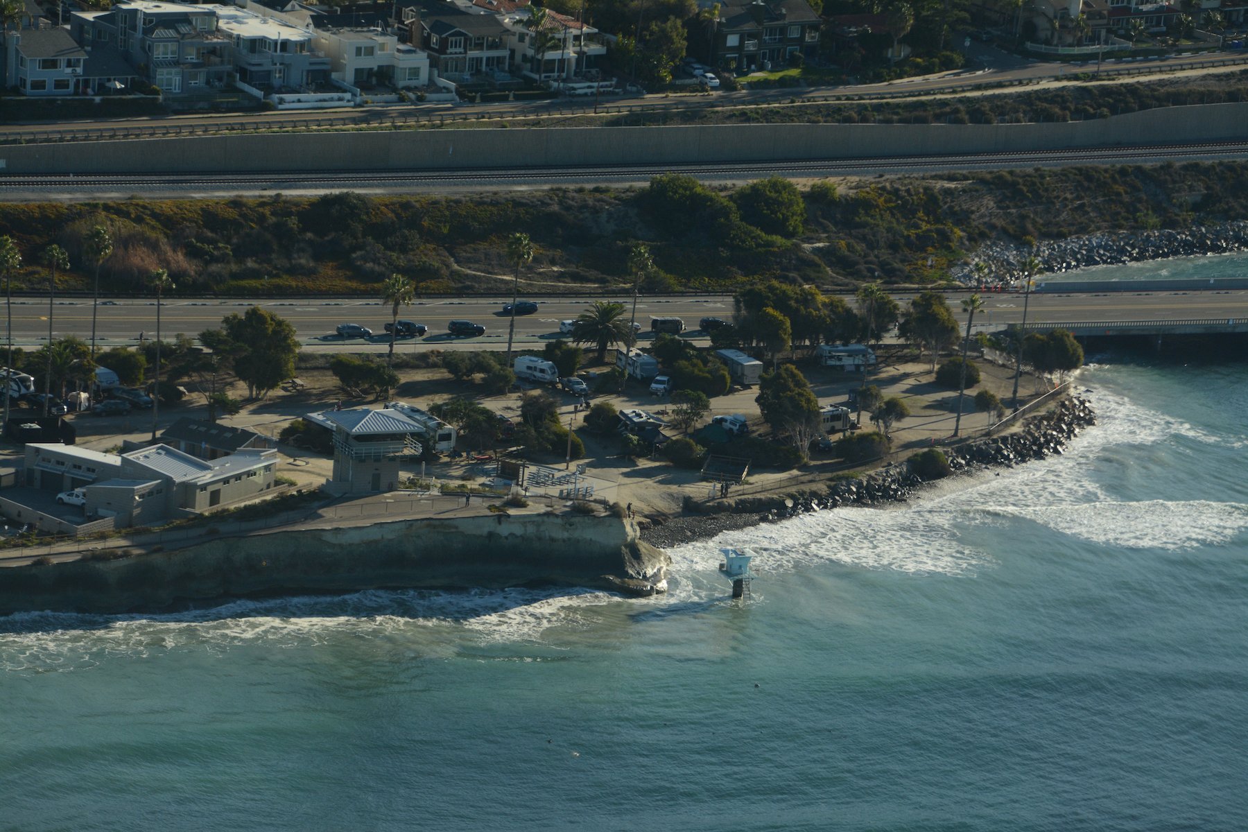 A drowned beach and underwater lifeguard tower at the San Elijo lagoon mouth, Cardiff State Beach. Photographed from an airplane during the 2021 King Tides.