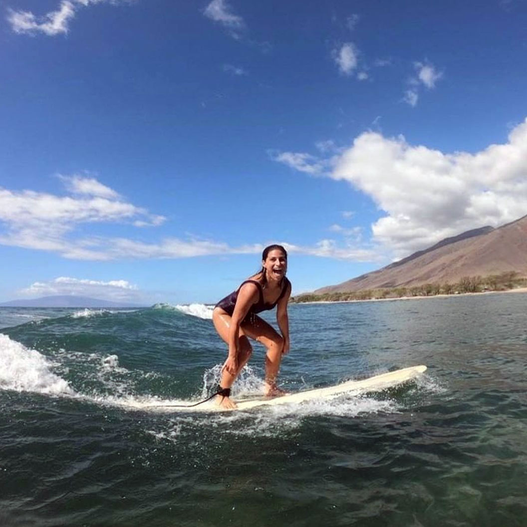 Erika Chavez surfing in west Maui