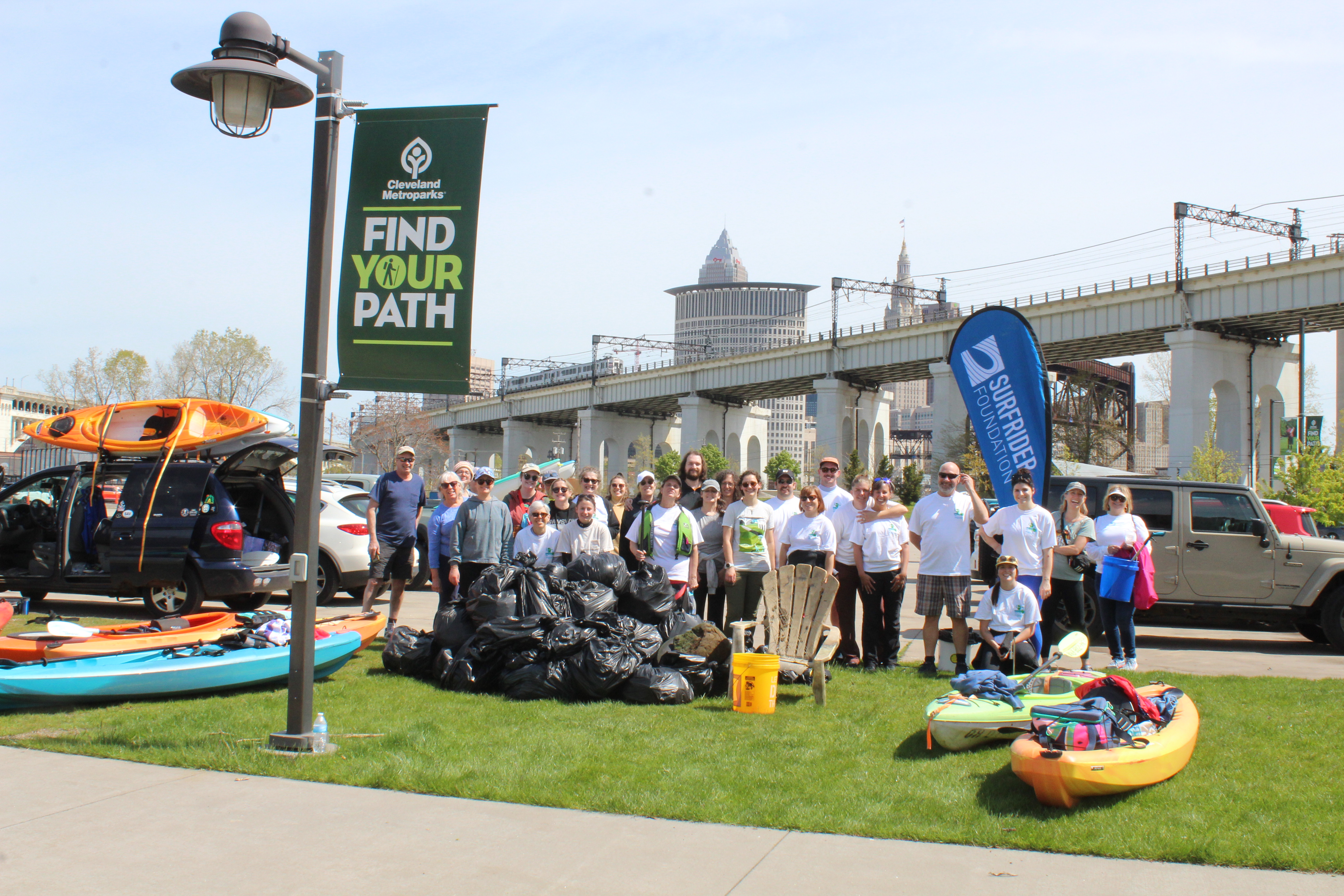The Northern Ohio Surfrider Foundation Chapter at a cleanup on the Cuyahoga River in Cleveland Ohio