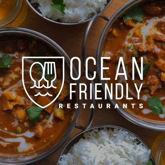 Ocean friendly restaurants logo with bowls of food behind it