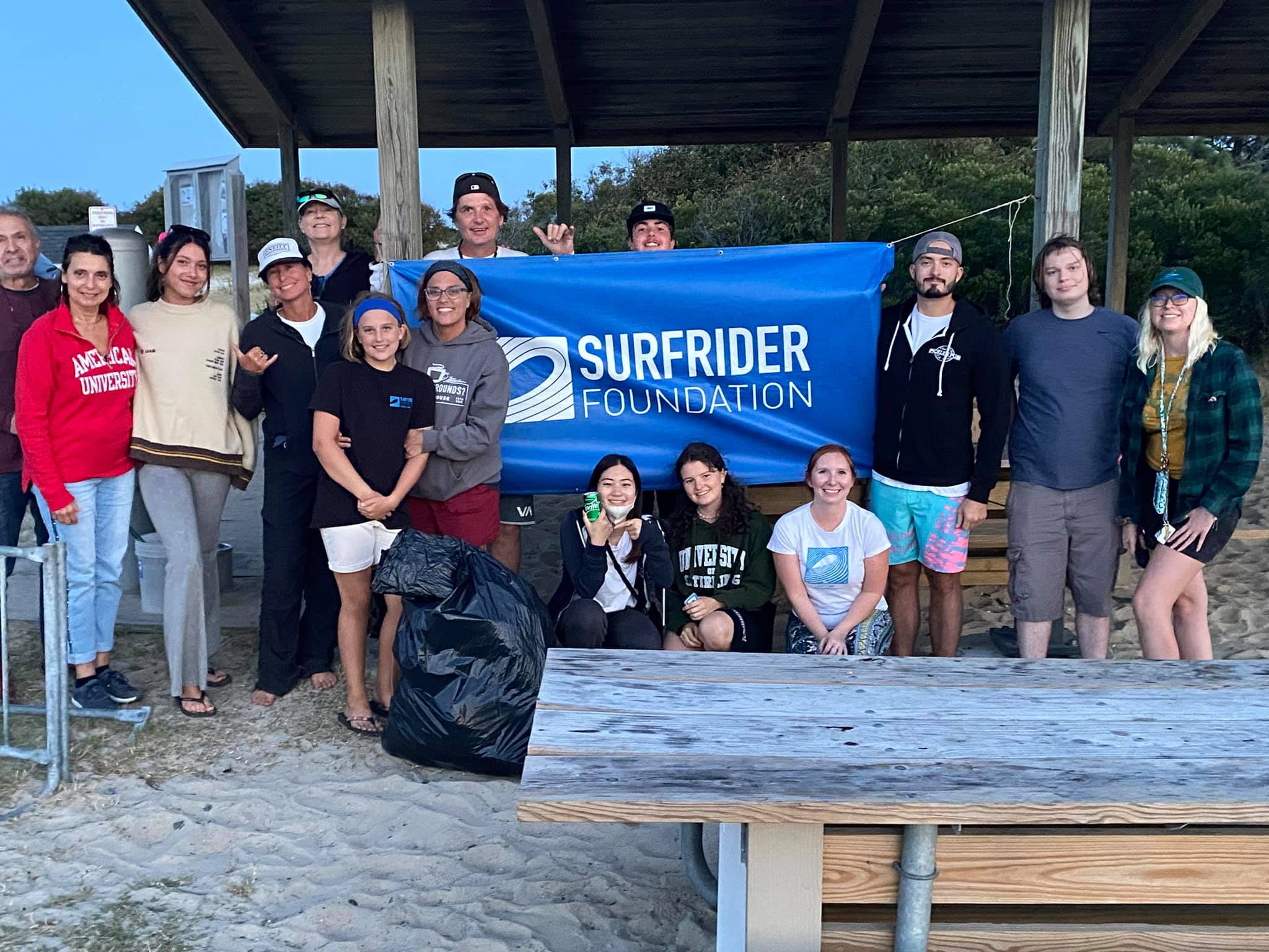 Group photo of Surfrider members after a beach cleanup at Assateague